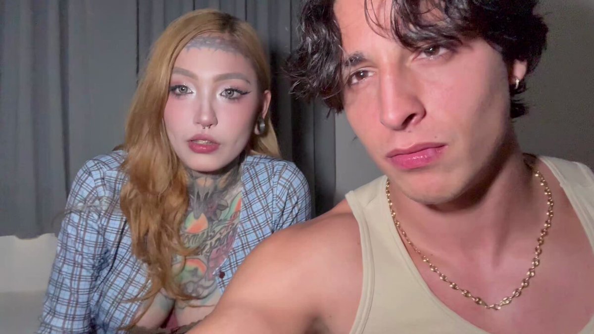 Tattooed beauty wrestles with a foreigner with a huge